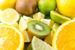 Photo of Slices of Kiwi, Lime, and Orange Fruits